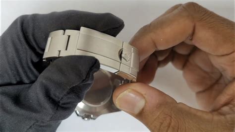 how to adjust a rolex watch band clasp|adjusting rolex watch jubilee strap.